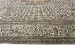 Corner detail of New Tabriz rug showing border pattern and Cork pile