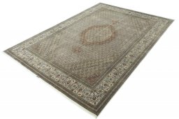 Corner detail of New Tabriz rug showing border pattern and Cork pile