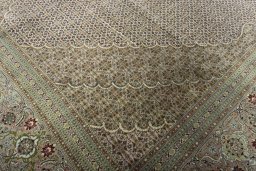 Close-up detail of 2000s Tabriz rug from Iran / Persia showing Cork weave