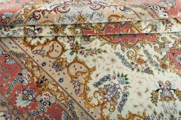 Surface texture of New Tabriz rug with natural Cork and intricate pattern