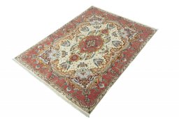 Corner detail of New Tabriz rug showing border pattern and Cork pile