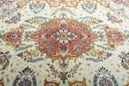 Central medallion detail of New Tabriz rug from Iran / Persia