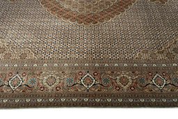 Corner detail of New Tabriz rug showing border pattern and Cork pile