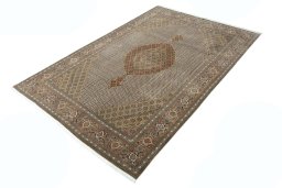 Corner detail of New Tabriz rug showing border pattern and Cork pile