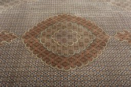 Central medallion detail of New Tabriz rug from Iran / Persia
