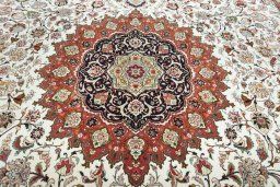 Central medallion detail of New Tabriz rug from Iran / Persia