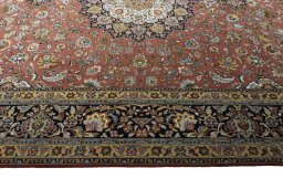 Close-up detail of New Tabriz rug from Iran / Persia showing Cork weave