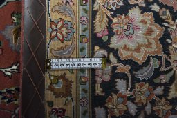 Central medallion detail of New Tabriz rug from Iran / Persia