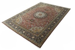 Corner detail of New Tabriz rug showing border pattern and Cork pile