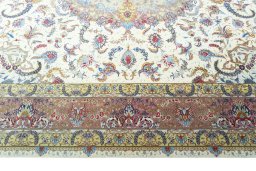 Corner detail of New Tabriz rug showing border pattern and Cork pile