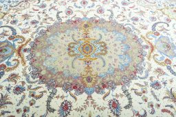 Central medallion detail of New Tabriz rug from Iran / Persia