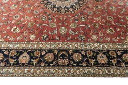 Corner detail of New Tabriz rug showing border pattern and Cork pile