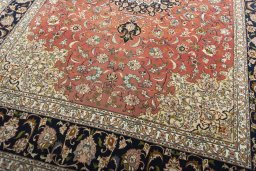 Close-up detail of New Tabriz rug from Iran / Persia showing Cork weave