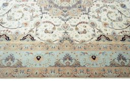 Corner detail of New Tabriz rug showing border pattern and Cork pile