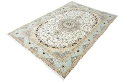 Corner detail of New Tabriz rug showing border pattern and Cork pile