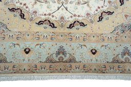 Full view of New Tabriz rug from Iran / Persia, 294 × 203 cm in Beige tones