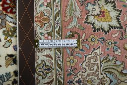 Close-up detail of New Tabriz rug from Iran / Persia showing Cork weave