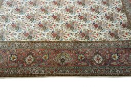 Close-up detail of New Tabriz rug from Iran / Persia showing Cork weave