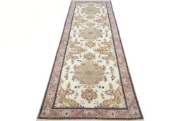 Surface texture of New Tabriz rug with natural Cork and intricate pattern