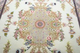 Central medallion detail of New Tabriz rug from Iran / Persia