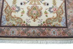 Close-up detail of New Tabriz rug from Iran / Persia showing Cork weave