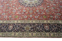Corner detail of New Tabriz rug showing border pattern and Cork pile