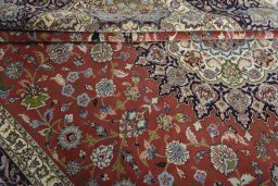 Close-up detail of New Tabriz rug from Iran / Persia showing Cork weave