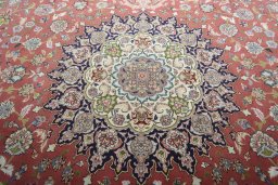 Central medallion detail of New Tabriz rug from Iran / Persia