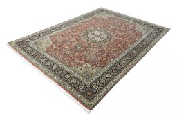 Corner detail of New Tabriz rug showing border pattern and Cork pile