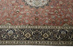 Corner detail of New Tabriz rug showing border pattern and Cork pile