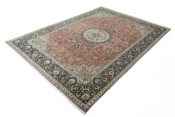 Corner detail of New Tabriz rug showing border pattern and Cork pile