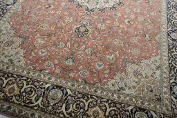 Close-up detail of New Tabriz rug from Iran / Persia showing Cork weave