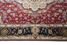 Corner detail of New Tabriz rug showing border pattern and Cork pile