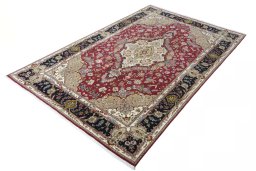 Corner detail of New Tabriz rug showing border pattern and Cork pile