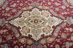 Central medallion detail of New Tabriz rug from Iran / Persia