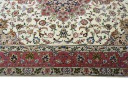 Corner detail of New Tabriz rug showing border pattern and Cork pile