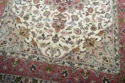 Close-up detail of New Tabriz rug from Iran / Persia showing Cork weave