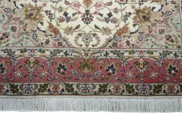Full view of New Tabriz rug from Iran / Persia, 204 × 154 cm in Beige tones