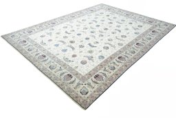 Corner detail of New Tabriz rug showing border pattern and Cork pile