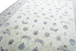 Backside of handmade New Tabriz rug showing knot structure and weave density