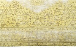 Corner detail of 1970s Tabriz rug showing border pattern and Wool pile