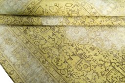 Close-up detail of 1970s Tabriz rug from Iran / Persia showing Wool weave