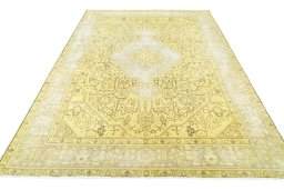 Surface texture of 1970s Tabriz rug with natural Wool and intricate pattern