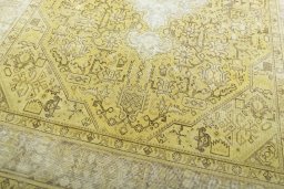 Close-up detail of 1970s Tabriz rug from Iran / Persia showing Wool weave