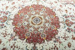 Backside of handmade New Tabriz rug showing knot structure and weave density