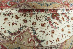 Close-up detail of New Tabriz rug from Iran / Persia showing Cork weave