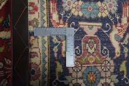 Close-up detail of 2000s Tabriz rug from Iran / Persia showing Wool weave