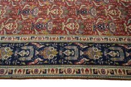 Close-up detail of 2000s Tabriz rug from Iran / Persia showing Wool weave