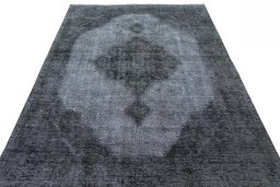 Surface texture of 1950s Tabriz rug with natural Wool and intricate pattern