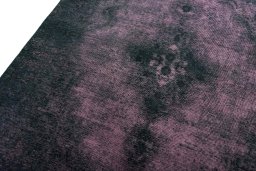 Backside of handmade 1950s Tabriz rug showing knot structure and weave density